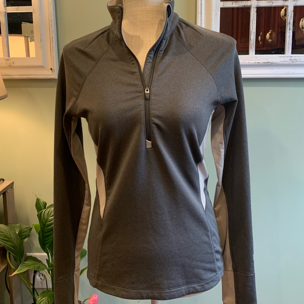 NWOT Under Armor Women's Quarter-Zip Top. Size small.